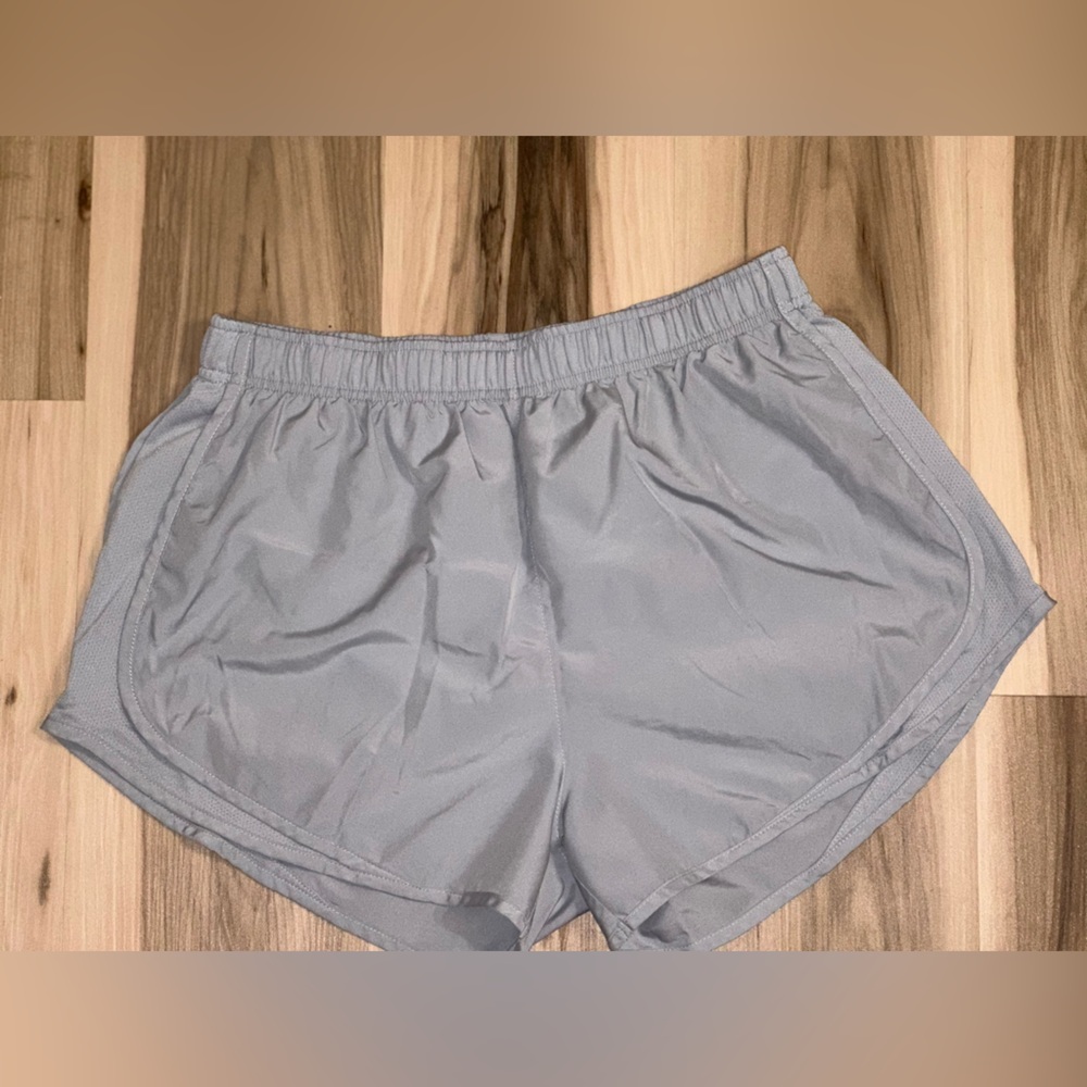Light gray dry tempo Nike women’s shorts. Size large